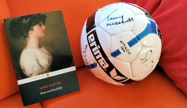 Jane Austen book and a football